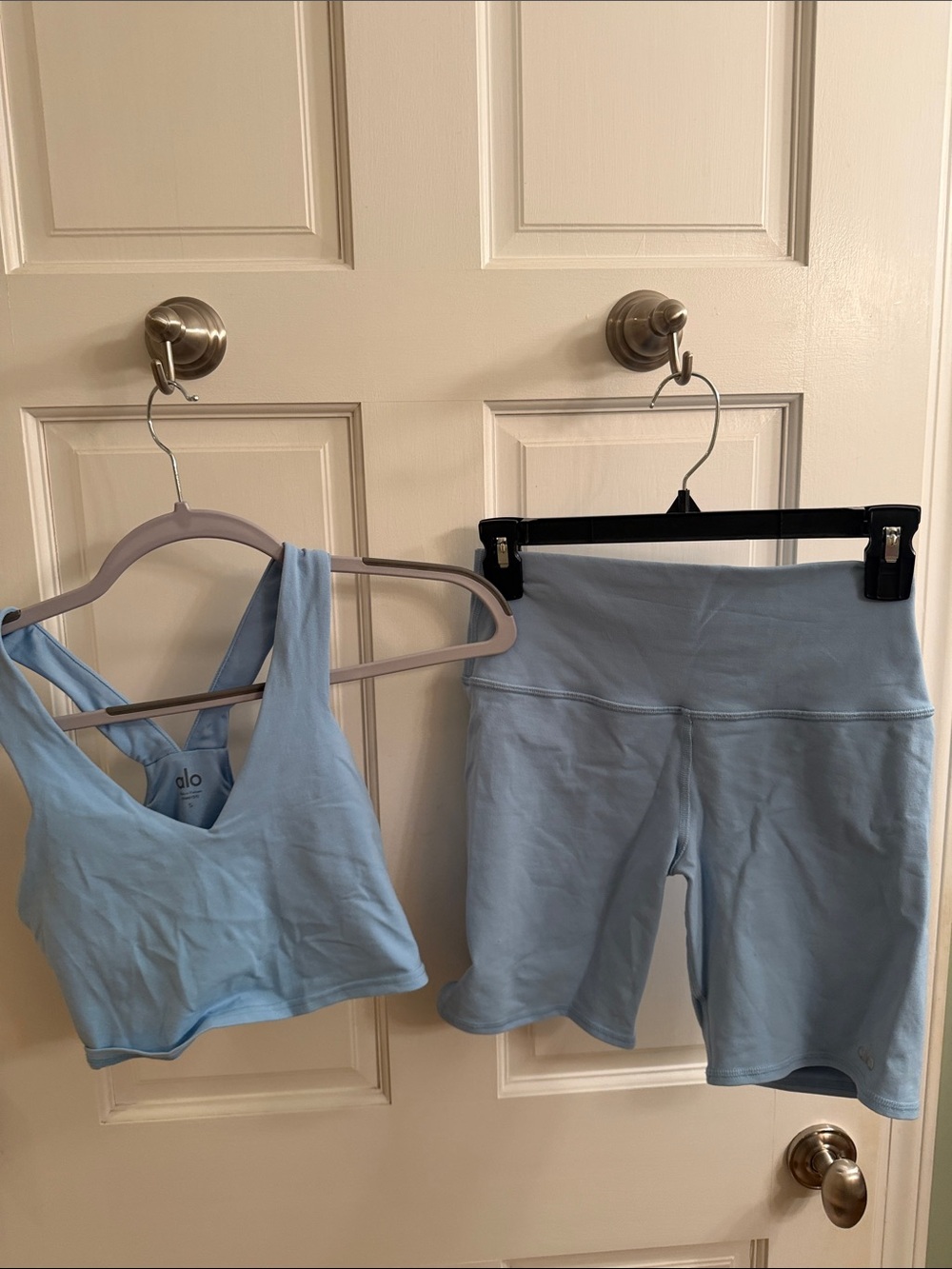 ALO Yoga Sky Blue Crisscross Sports Bra & High-Rise Bike Shorts Set